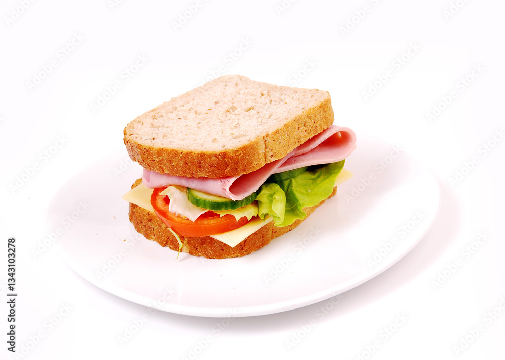Healthy ham sandwich with cheese, tomatoes on white background Healthy ham sandwich with cheese, tomatoes on white background