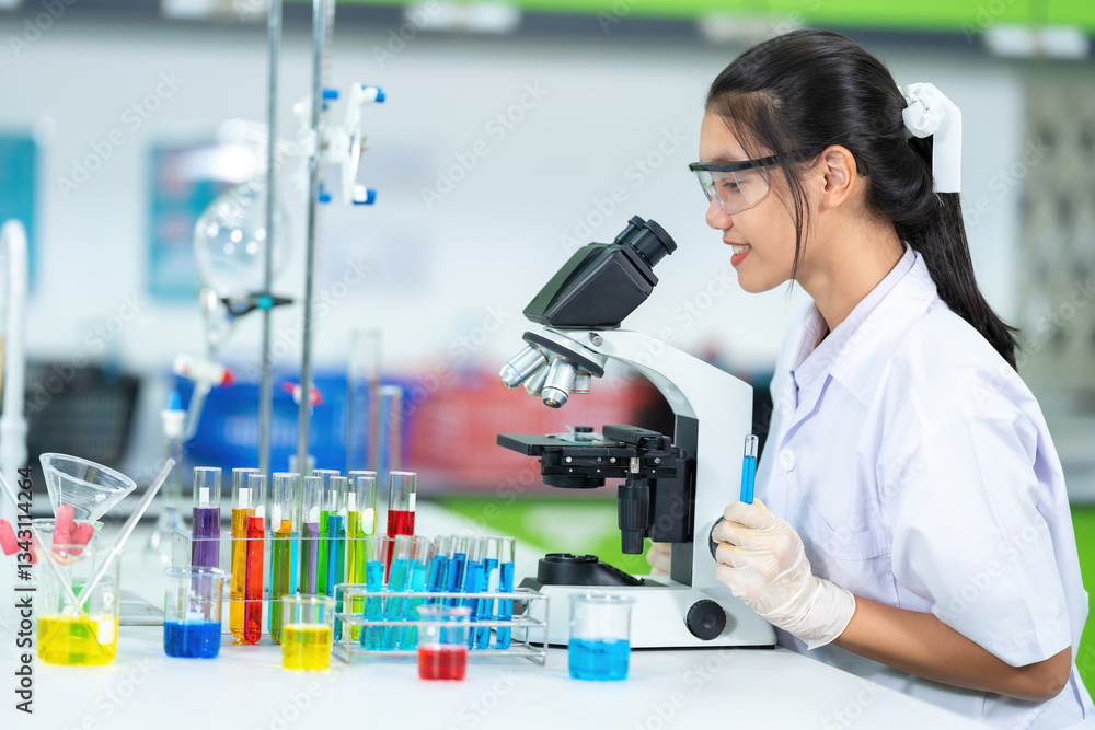 Fototapeta premium Conducting in-depth research, Asian female scientists in the lab explored various techniques to enhance medicine production while maintaining the highest levels of quality and efficacy.