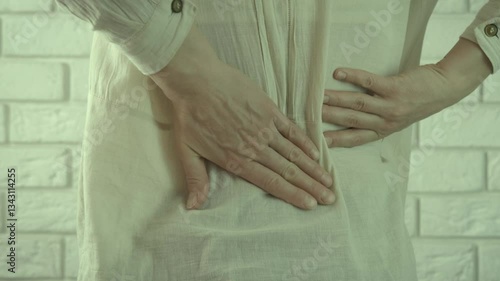 A woman with back pain