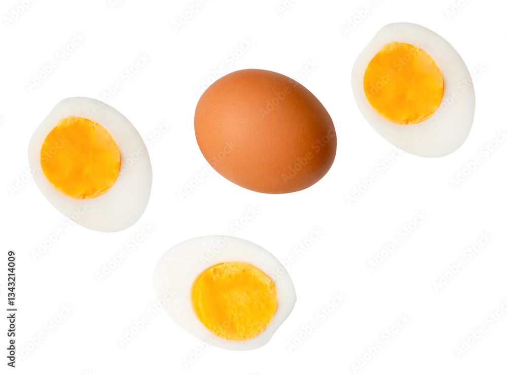 Top view set of raw brown chicken egg and cooked or boiled chicken eggs with egg yolk in three halves isolated on white background with clipping path Top view set of raw brown chicken egg and cooked or boiled chicken eggs with egg yolk in three halves isolated on white background with clipping path