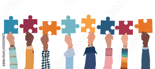Problem solving concept. Raised hand up of multicultural business women and business men holding a jigsaw puzzle piece. Metaphor.Strategy concept.Joining puzzle pieces.Match.Isolated