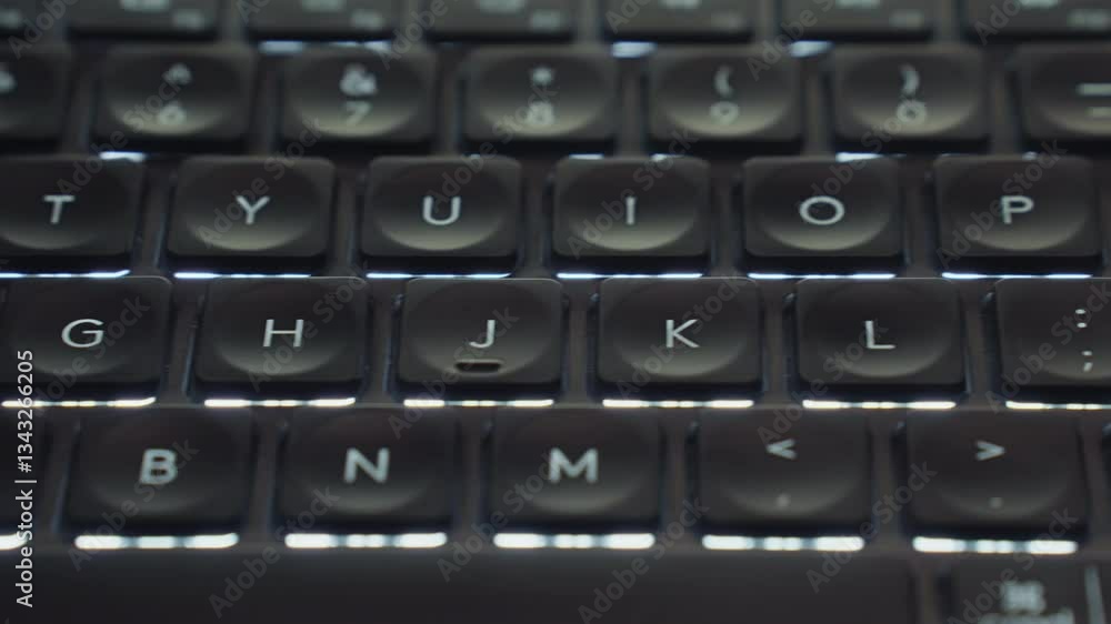 Close-up of an illuminated LED keyboard, glowing vibrantly Close-up of an illuminated LED keyboard, glowing vibrantly