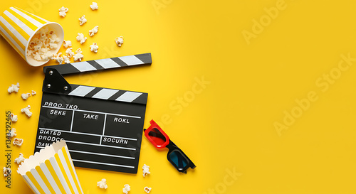popcorn and 3d glasses on a bright background. cinema concept, movie theater