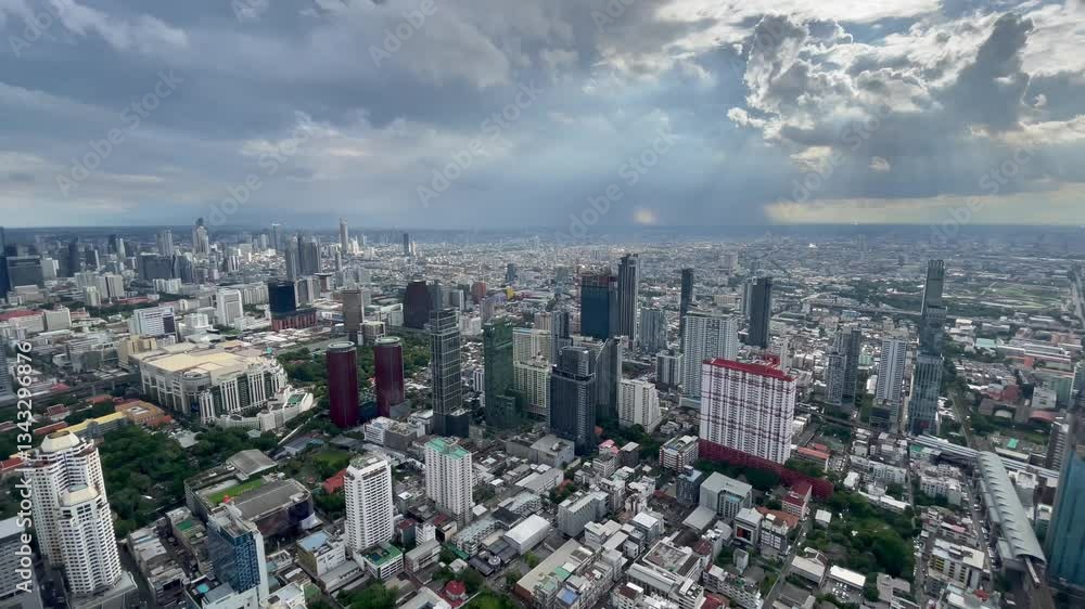 BANGKOK, THAILAND - AUGUST 2024 : Aerial high angle view of Bangkok city in daytime. View of buildings and streets around downtown Siam area. BANGKOK, THAILAND - AUGUST 2024 : Aerial high angle view of Bangkok city in daytime. View of buildings and streets around downtown Siam area.