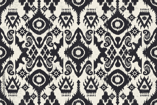 Ikat paisley embroidery on the fabric in Indonesia, India and Asian countries.geometric ethnic oriental seamless pattern.Aztec style. Illustration. Design for texture, fabric,clothing,wrapping,carpet.