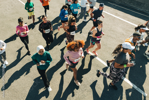 фотографія Diverse group of runners in a vibrant outdoor race
