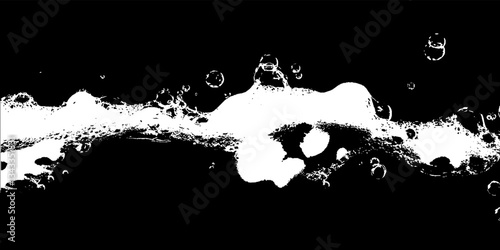 Dynamic foam texture creates an artistic display of bubbles and movement in a contrasting dark background, evoking fluidity and energy