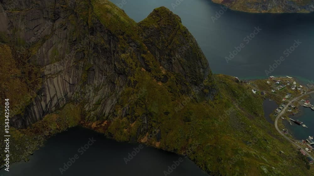 View of Lofoten islands from Reinebringen Hill (Moskenes municipality) after sunset, Revealing drone shot View of Lofoten islands from Reinebringen Hill (Moskenes municipality) after sunset, Revealing drone shot