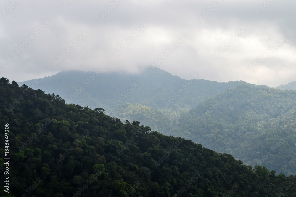 Obraz premium Dust pm 2.5 and Mist Clouds, High Angle Landscape view over Forest Mountains at Doi Langka Noi, Khun Chae National Park Northern Thailand.