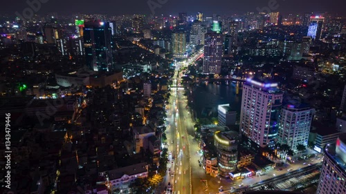 Wallpaper Mural Aerial timelapse of traffic in the business district and the illuminated Hanoi city skyline at night, Vietnam Torontodigital.ca