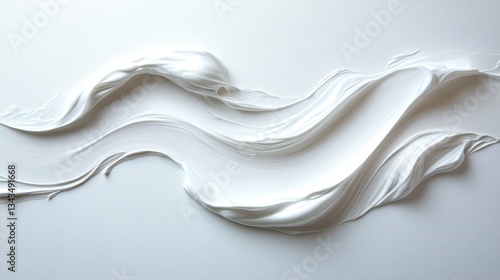 A pristine white swatch, smooth and velvety to the touch, lay nestled against a pristine white background, a testament to the purity and elegance of skincare.