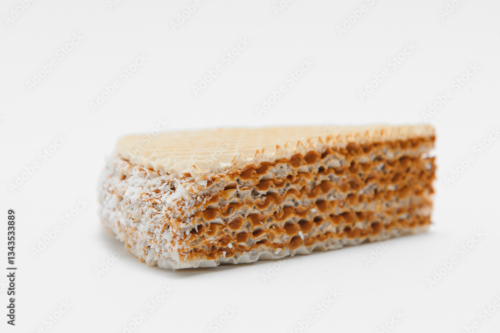 waffle with caramelized condensed milk on a white background waffle with caramelized condensed milk on a white background