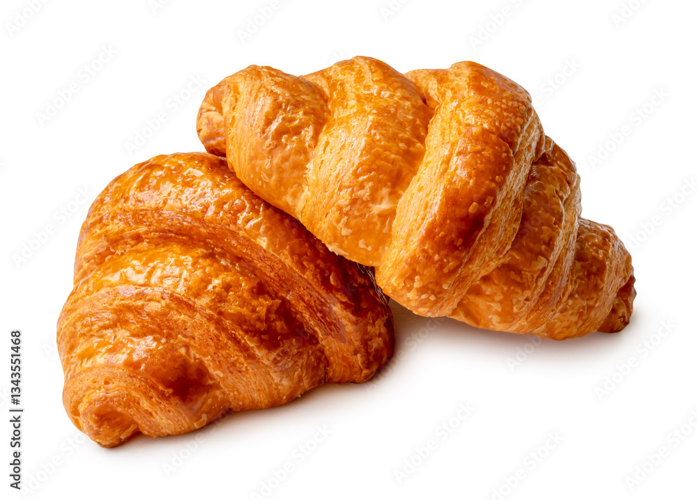 Side view of two brown or golden loaves of croissants in stack or heap isolated on white background with clipping path Side view of two brown or golden loaves of croissants in stack or heap isolated on white background with clipping path