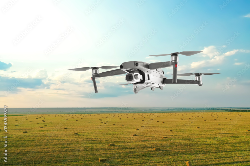 Drone with camera flying over fields. Unmanned aerial vehicle for surveillance Drone with camera flying over fields. Unmanned aerial vehicle for surveillance