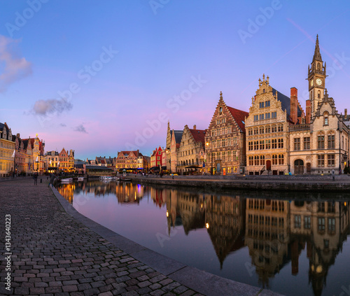 Obraz na płótnie Quay Graslei in Leie river at dusk. Picturesque view of the historical city center of Ghent (Gent), Belgium. w salonie