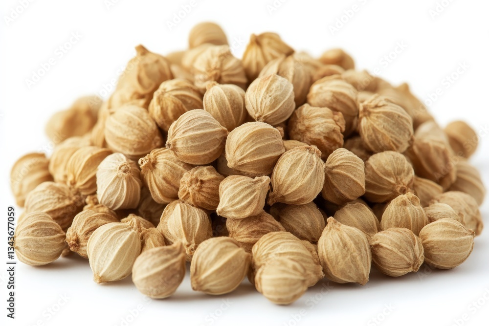 Coriander seeds arranged in a pile on a clean surface for culinary and medicinal uses in kitchens worldwide Coriander seeds arranged in a pile on a clean surface for culinary and medicinal uses in kitchens worldwide