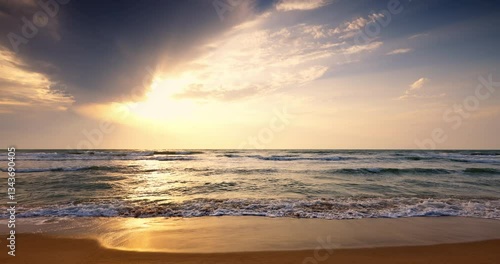 Beautiful sunrise over the sea waves and beach sand, tropical ocean sunset landscape