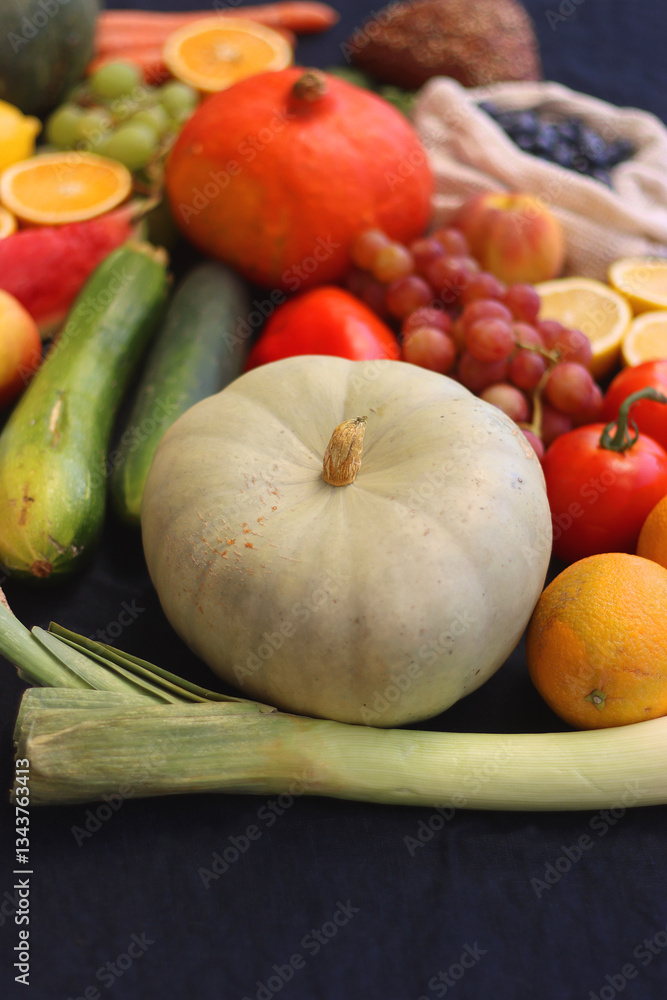 Various healthy fruits, vegetables and cereals on dark background. Selective focus.
