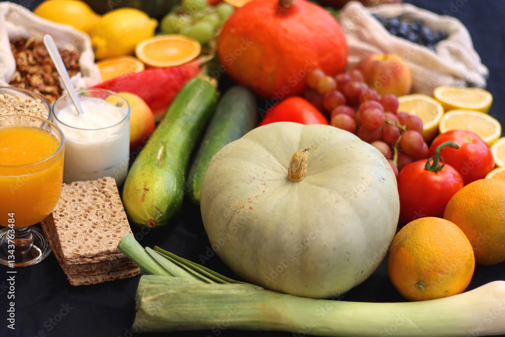 Various healthy fruits, vegetables and cereals on dark background. Selective focus.