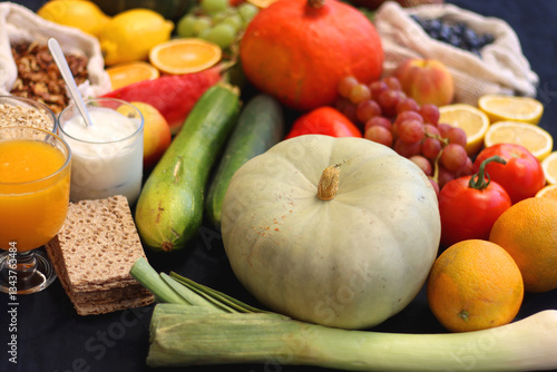 Obraz na płótnie Various healthy fruits, vegetables and cereals on dark background. Selective focus. w salonie