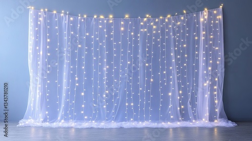 Elegant sheer curtain backdrop illuminated with warm fairy lights for special events