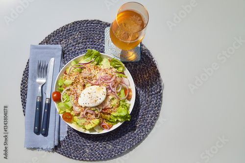 Fresh Gourmet Salad with Poached Egg and Craft Beer