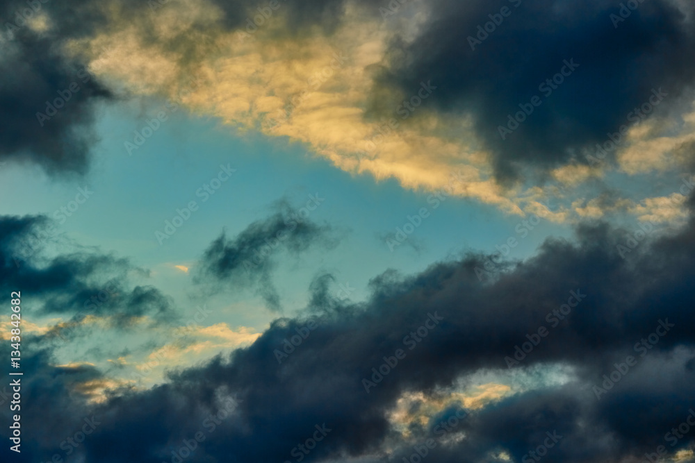 The triangular shape of the clouds points towards the wind, like an invisible arrow indicating the way. Symbolizes a landmark and the choice of the right direction. The triangular shape of the clouds points towards the wind, like an invisible arrow indicating the way. Symbolizes a landmark and the choice of the right direction.