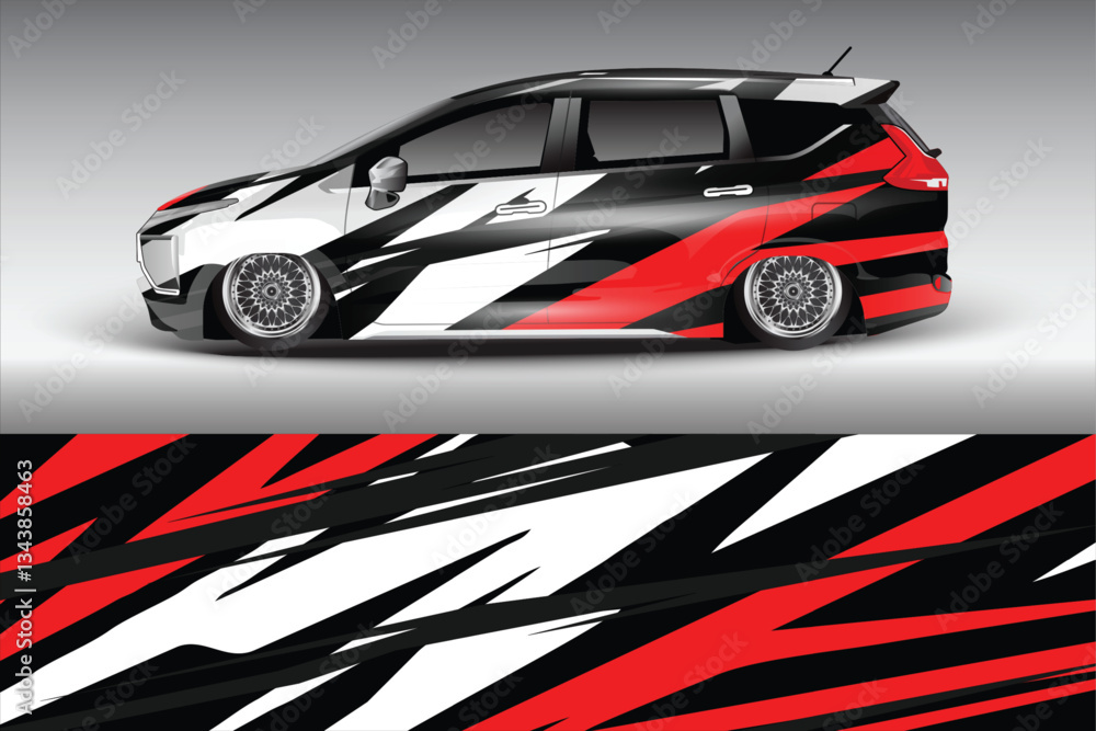 Stylish modified car with striking black and red graphics parked against a sleek gray backdrop Stylish modified car with striking black and red graphics parked against a sleek gray backdrop