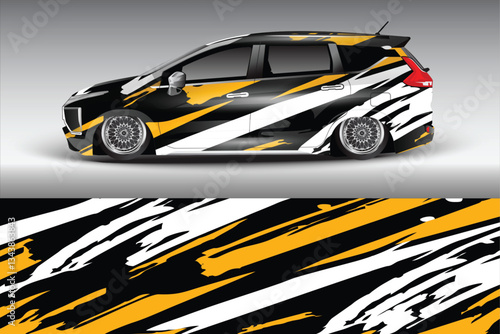 Stylishly designed modified car with bold black, white, and yellow stripes against a gradient backdrop