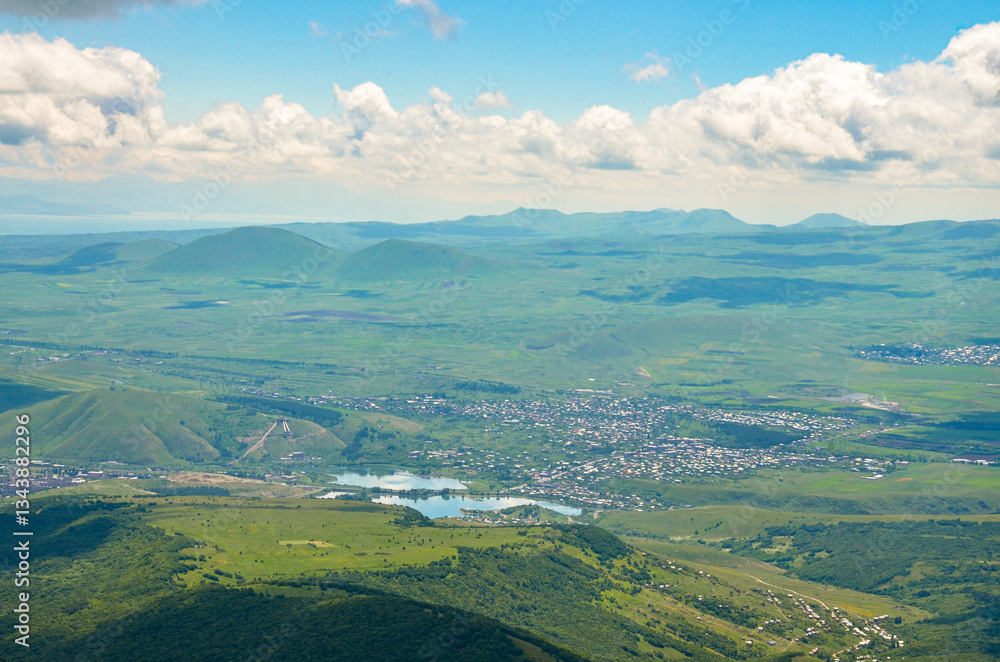 Naklejka premium Hrazdan Reservoir, Mount Mets Lchasar and Vardenis Ridge scenic view from the top of Teghenis Mountain (Tsaghkadzor, Armenia) 