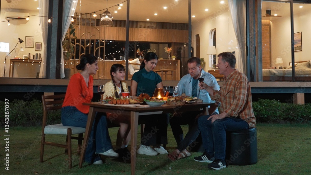 Fototapeta premium Family gather celebrate holiday. Parents, grandparents and girl together to talk and have dinner party food. Outdoor activity for spending time with multigeneration cross generation gap. Divergence.