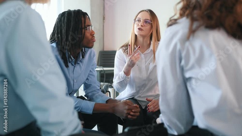 Wallpaper Mural Talking about problems. People are in group psychological support room together. Torontodigital.ca