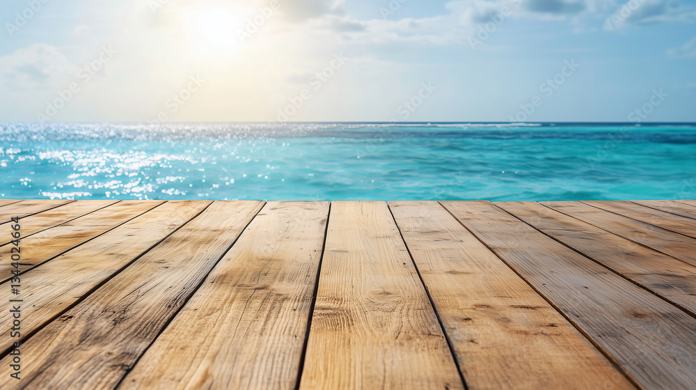 Wooden deck overlooking turquoise ocean with sunlight reflections. Scenic summer seascape background with copy space Wooden deck overlooking turquoise ocean with sunlight reflections. Scenic summer seascape background with copy space