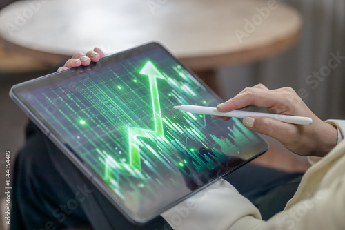 Finance, saving, and investment with the hands of a female broker holding a tablet with CGI, special effects, and a digital screen. Close-up of a banker, accountant, or manager working on growth.