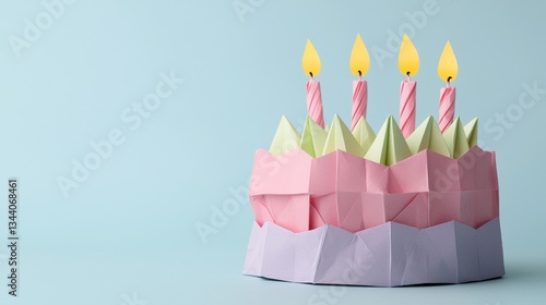 Colorful Origami Cake with Four Candles for Celebrations and Parties on a Soft Blue Background