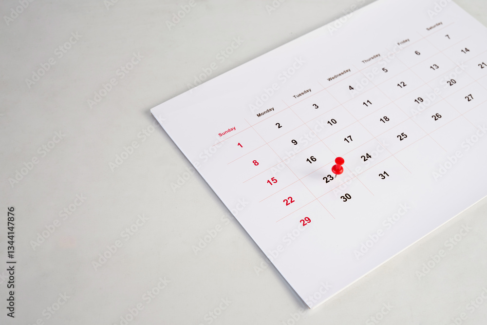 red pin stack on calendar for background