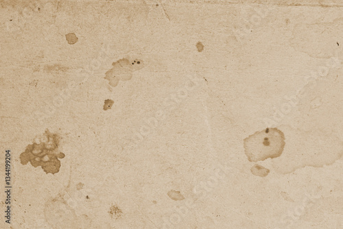 Texture of old moldy paper with dirt stains, spots. Aged vintage paper with stains and imperfections. Antique textured background perfect for retro and grunge designs