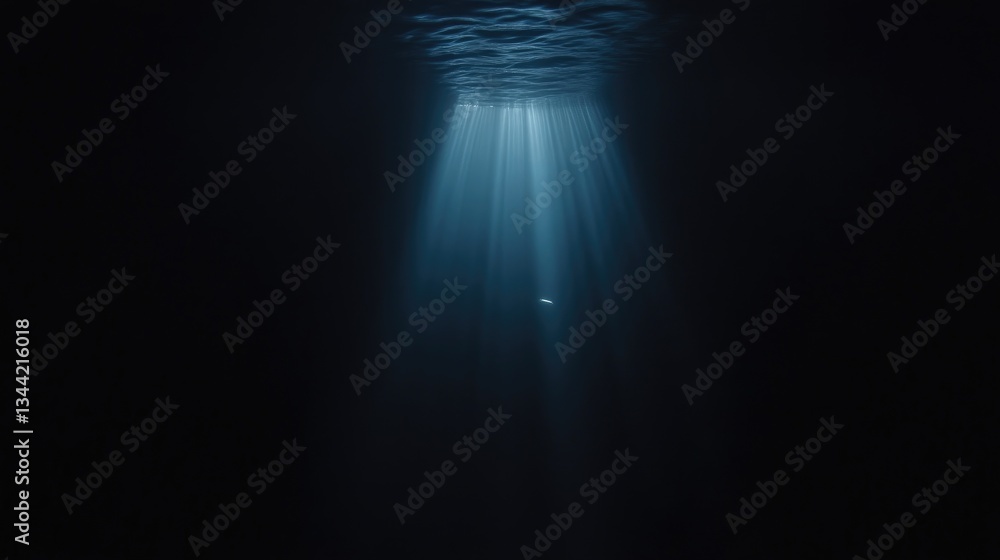Obraz premium Submerged light beams in dark abyss