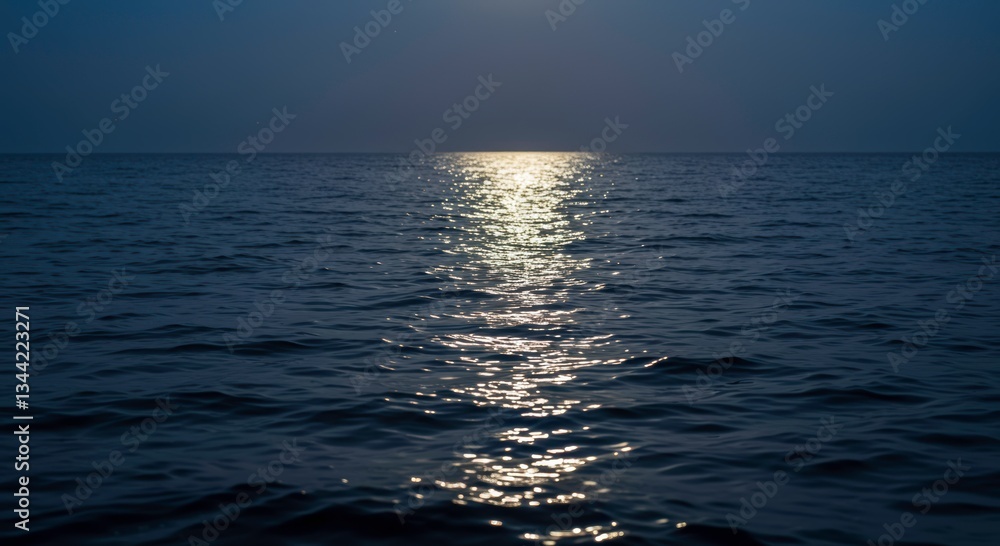 Obraz premium Serene Moonlight on Dark Ocean Water Glimmering Reflections Night Sea
