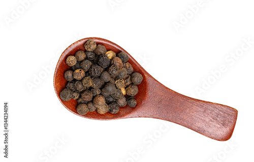 different spices in a wooden spoon