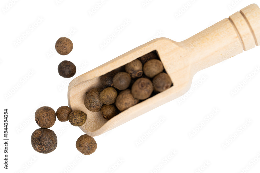 different spices in a wooden spoon
