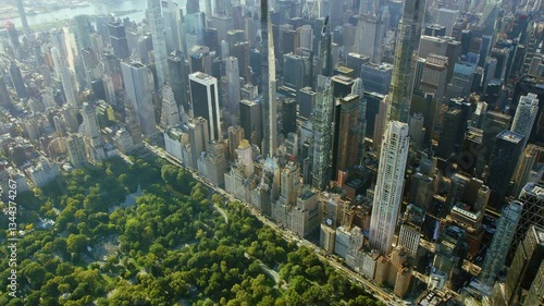 Aerial View Of  Manhattan Skyscrapers revealing beautiful Central Park, Midtown Skyline. Billionaires Row in 57th and 59th street. New York City.  High Quality Content Shot from Helicopter.