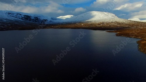 Aerial view of Loch Shin and Ben More Assynt in the Scottish Highlands of Scotland UK