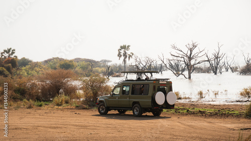 Safari vehicle parked near lake manyara in tanzania, africa