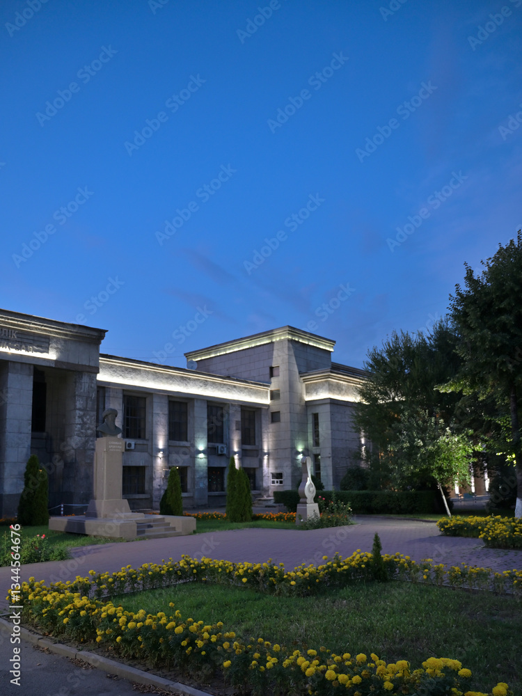 Building light with electric light in the evening. Kaldayakov street. Concert place.