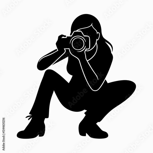 Silhouette of a photographer with a camera in a studio setting