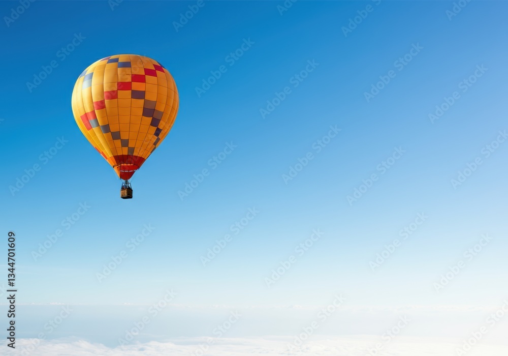Naklejka premium Colorful hot air balloon soaring in a clear blue sky