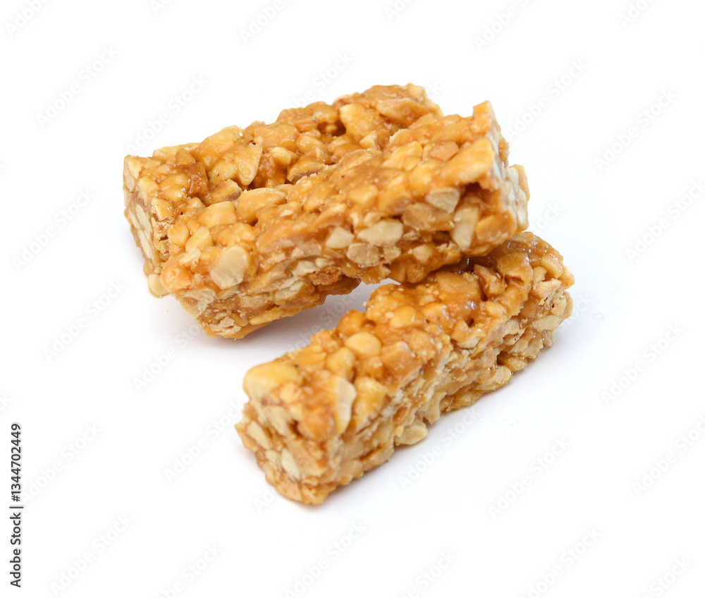 Butter bars with peanuts on white background Butter bars with peanuts on white background