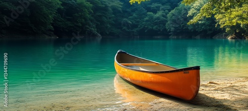 Tranquil Canoe Resting on a Serene Lake Surrounded by Lush Greenery in the Ea...
