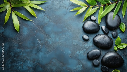 Relaxing Arrangement of Smooth Stones and Green Leaves on a Textured Surface